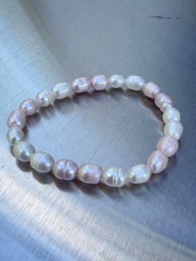 7” stretchy freshwater pink and white 9x7mm pearl bracelet!